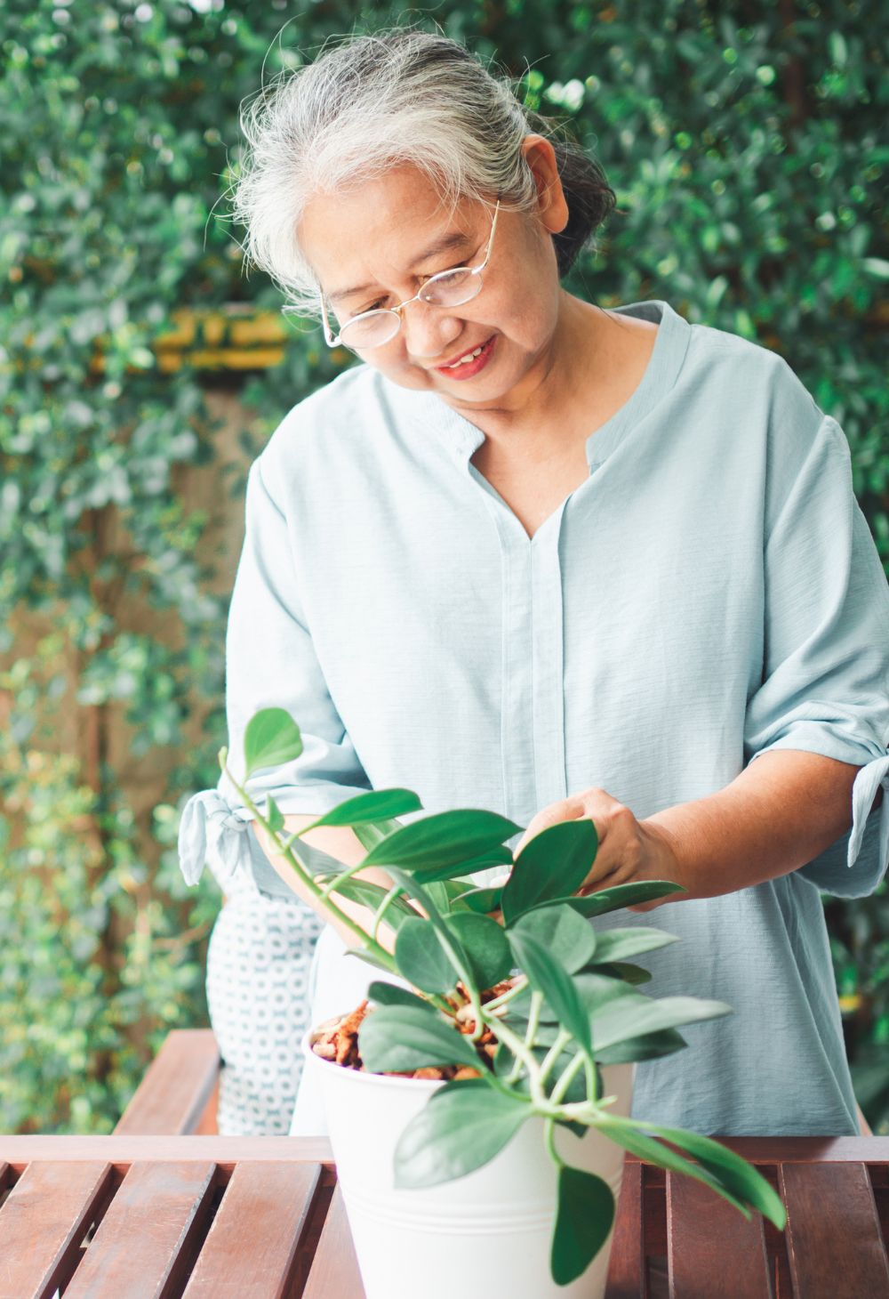 elderly working on plant