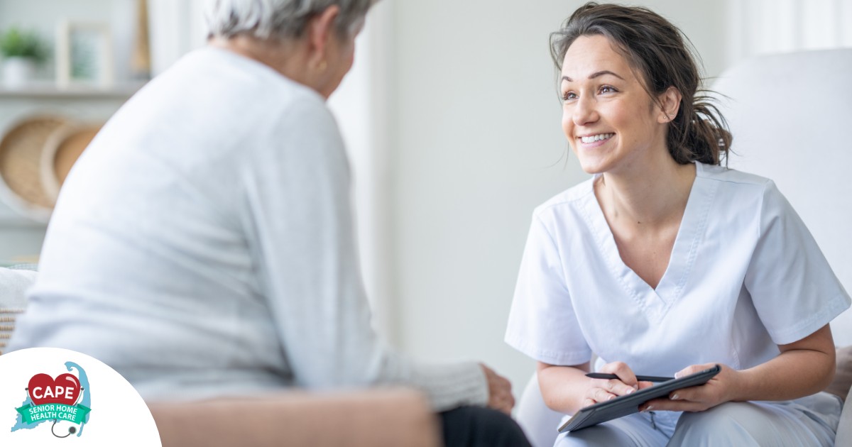 A woman smiles while with a client representing the pros of the home care industry.