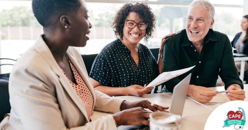 A couple talks with and advisor, representing the type of preparation that is crucial for successful senior care planning.