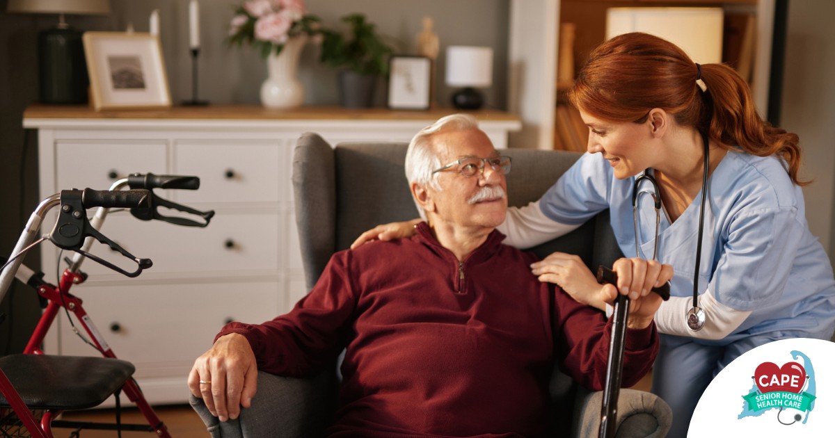 A caregiver helping a woman with a walker make her senior home safer.
