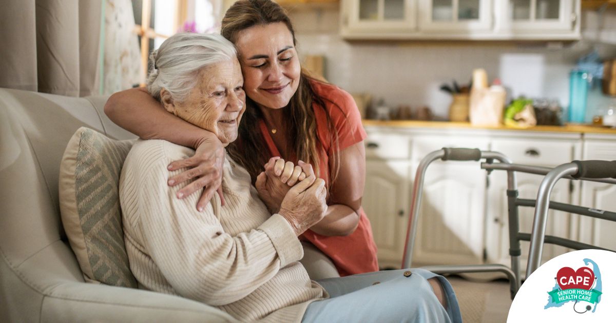 Caregiver supporting an elderly woman in the transition to senior home care