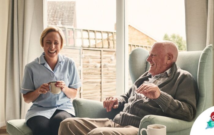 A caregiver provides Memory Care at Home to a senior