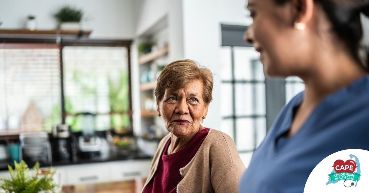 Caregiver provides attentive senior care as part of diabetes awareness